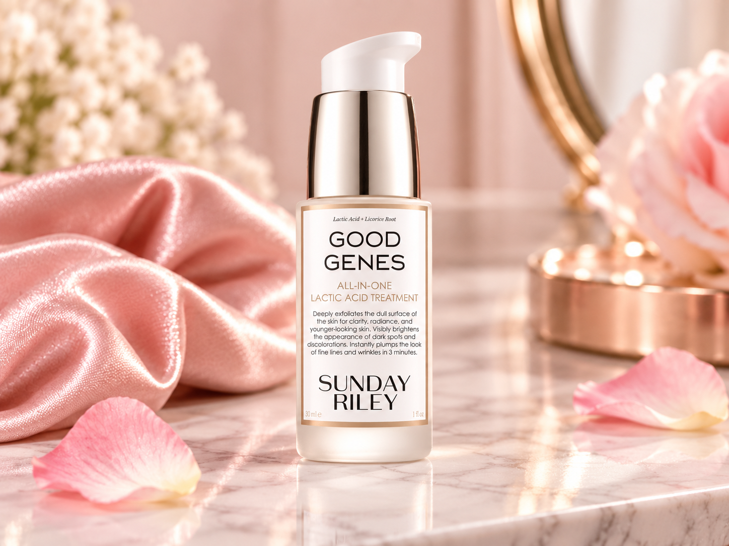 Sunday Riley Good Genes treatment displayed in a feminine vanity setting with blush pink accents.