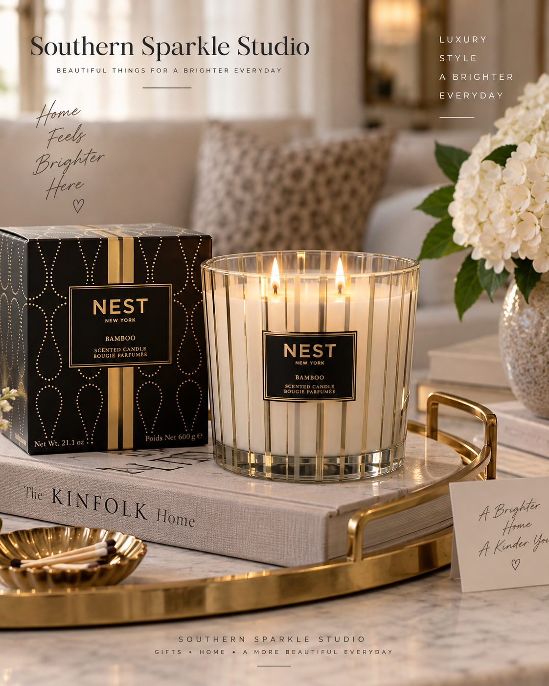 NEST New York candle displayed on an elegant gold and marble tray.